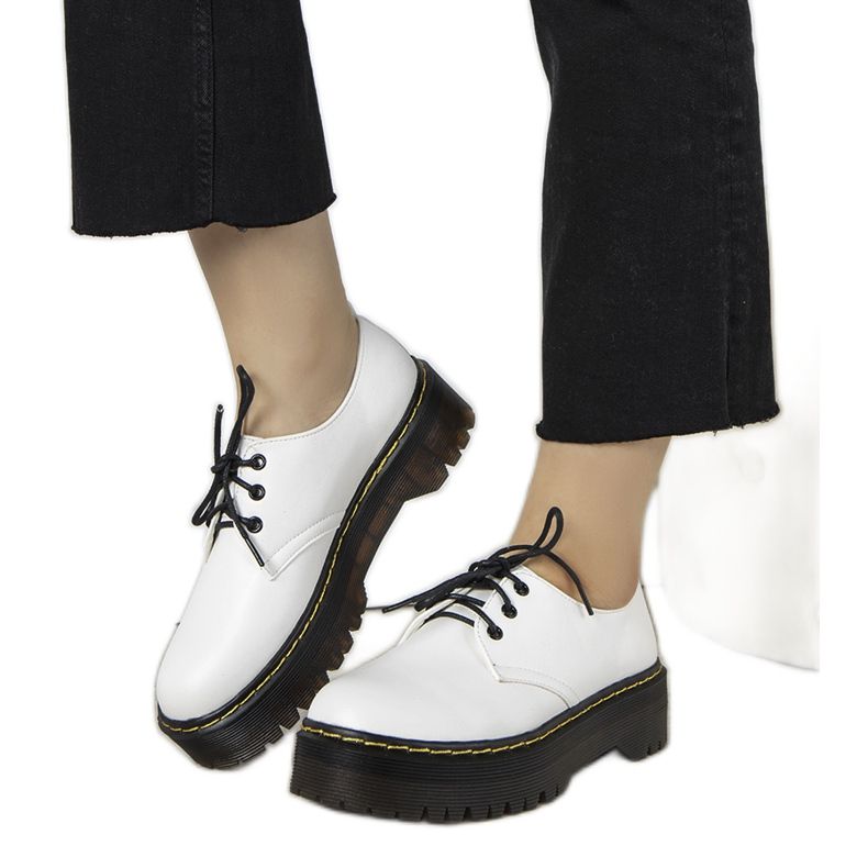 White shoes on a thick Ronde sole White shoes on a thick Ronde sole