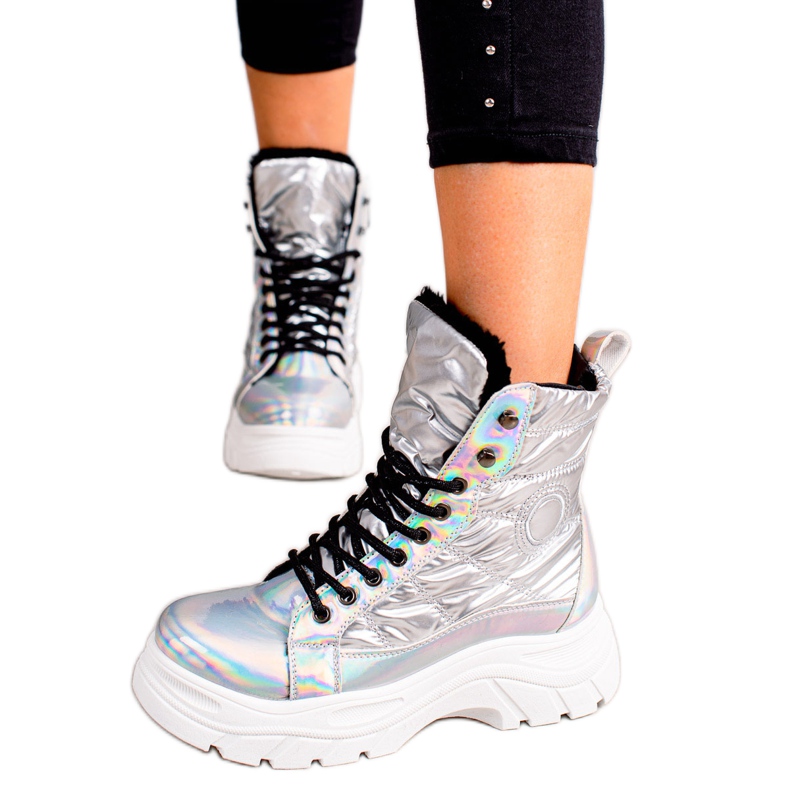 Silver boots on the VINCEZA platform