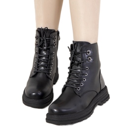 Black insulated boots on a high Dora sole