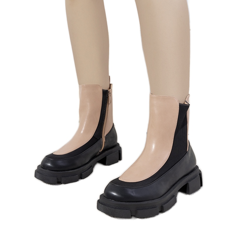 Black and pink boots on a thick Lynne sole beige