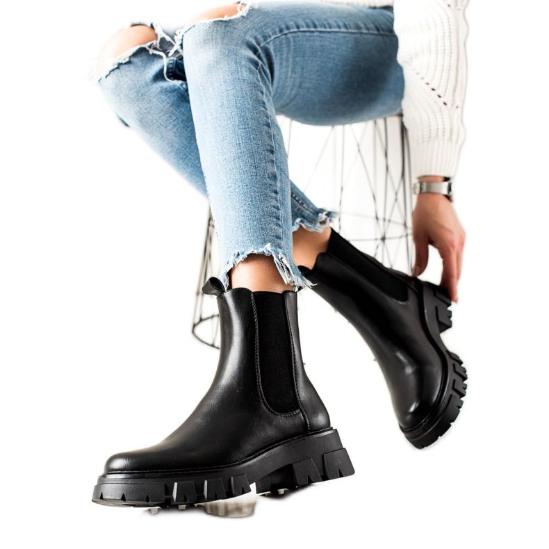 Black Chelsea boots by Sergio Leone