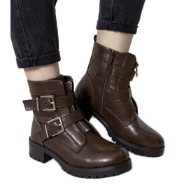 Santos brown boots with a decorative clasp