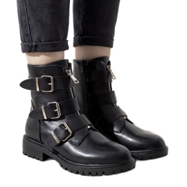 Black padded boots with a decorative zipper