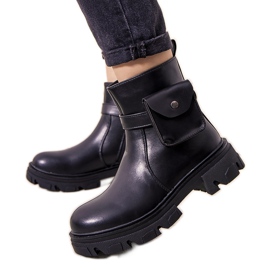 Black insulated boots with a Millikin sachet