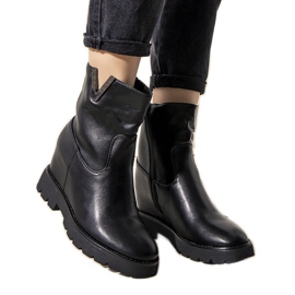 Black women's boots on the Goldie wedge