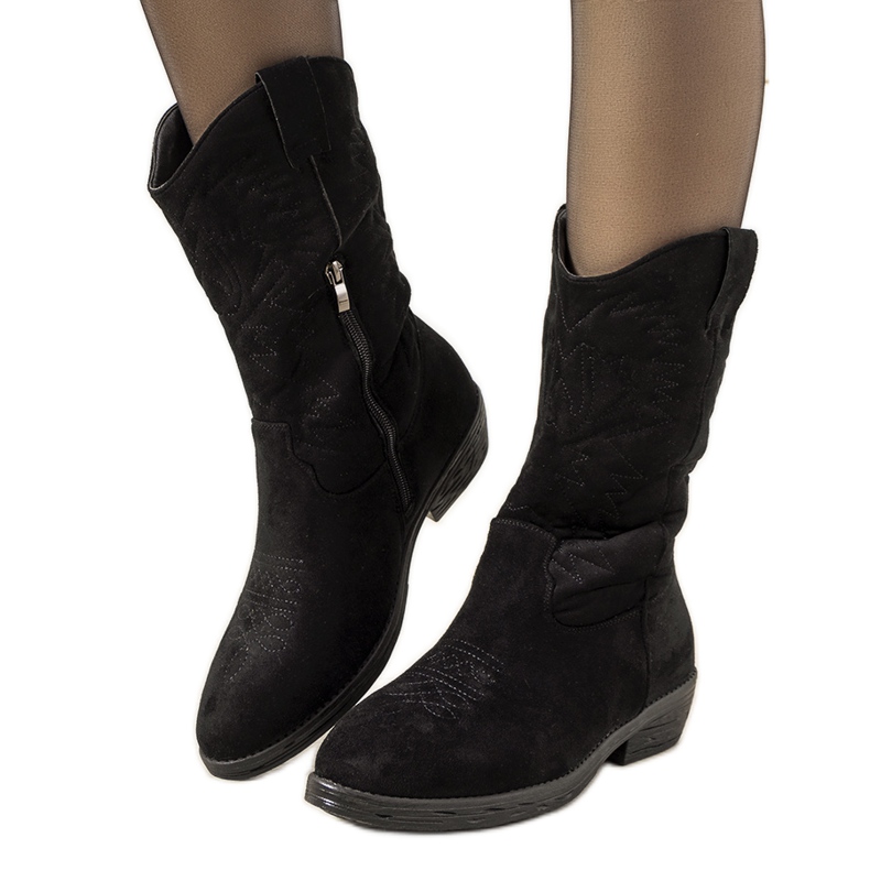 Black cowboy boots from Roxanne