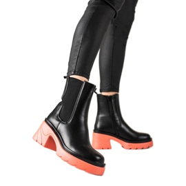 TRENDI Boots on a pink platform black TRENDI Boots on a pink platform black