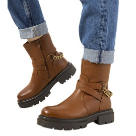 Brown insulated boots with Porta chain