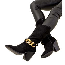 Black cowboy boots on the Effie post Black cowboy boots on the Effie post