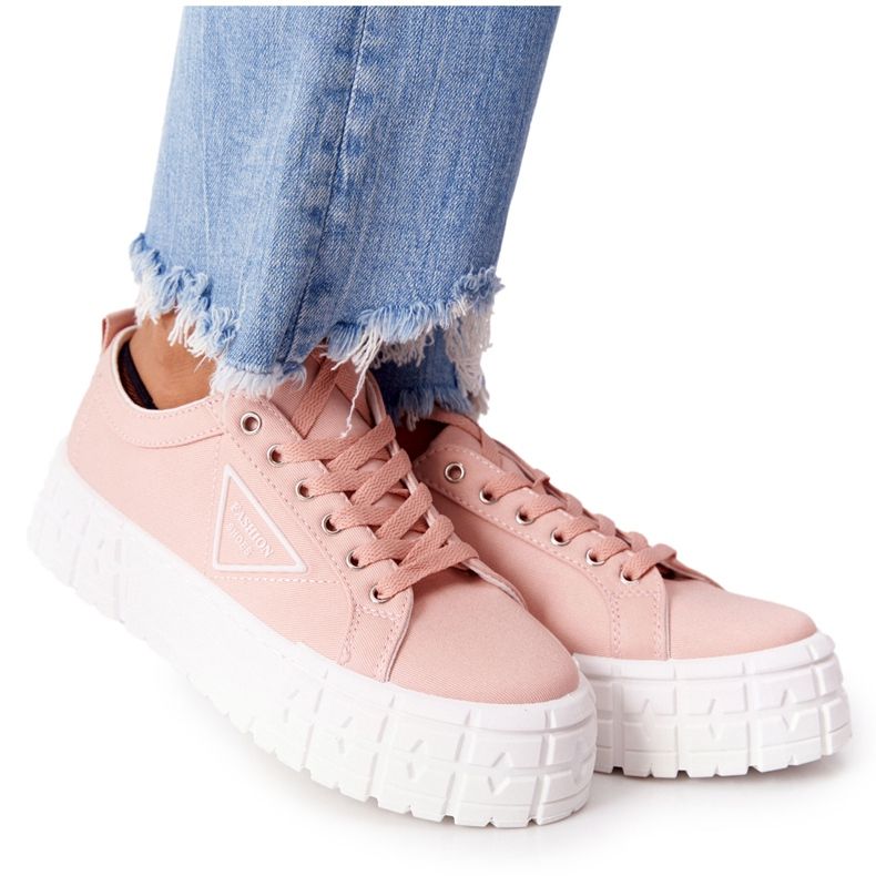 Women's pink sneakers on the platform