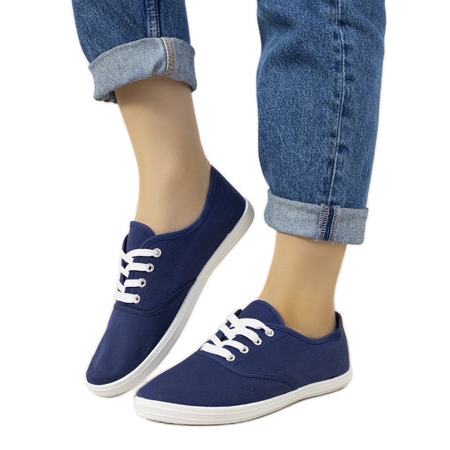 Ladies navy top and white shoes