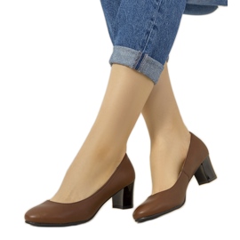 Brown pumps on the pillar