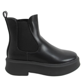 Chelsea boots on a thick Laos Black sole