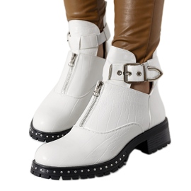 White boots with cutouts from Hays