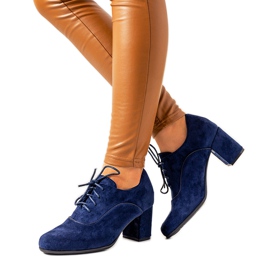 Navy blue ankle boots on the Bird post