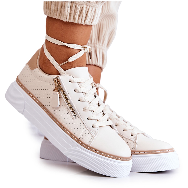 FB2 Sports Shoes On The Beige Platform Louis