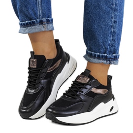 Black Nazaria sports shoes golden