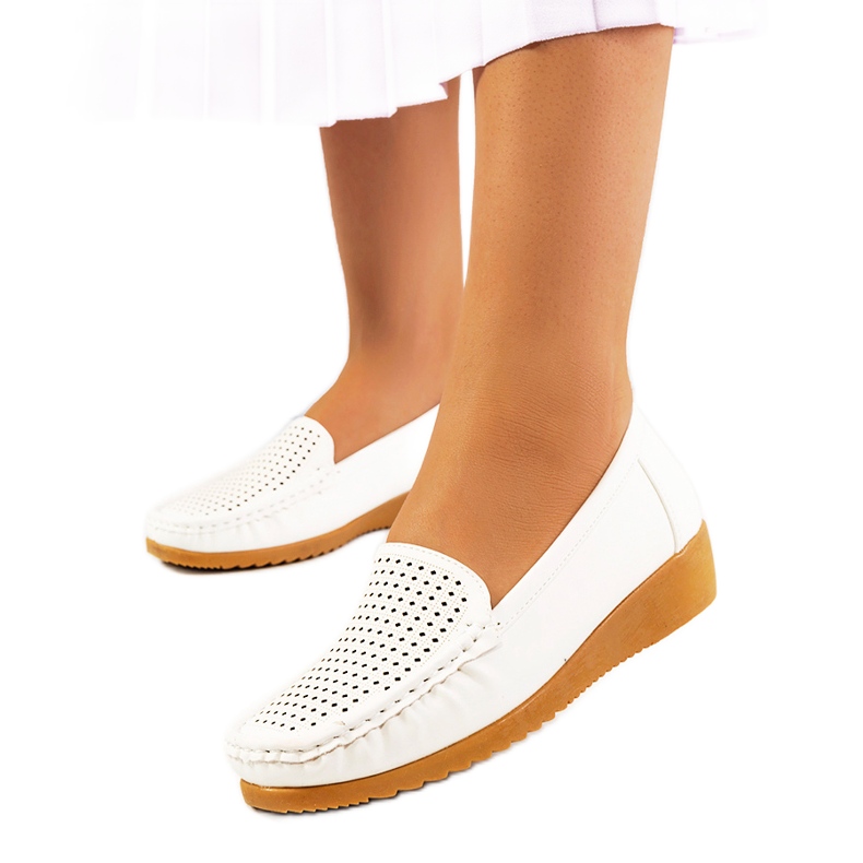 White moccasins on the Dalal wedge heel