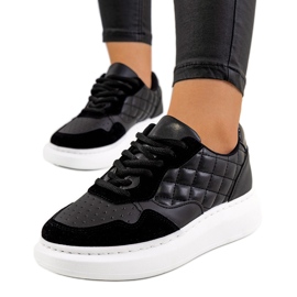 Black sneakers on the Gasperi platform