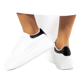 White sneakers on a high Lelica platform White sneakers on a high Lelica platform