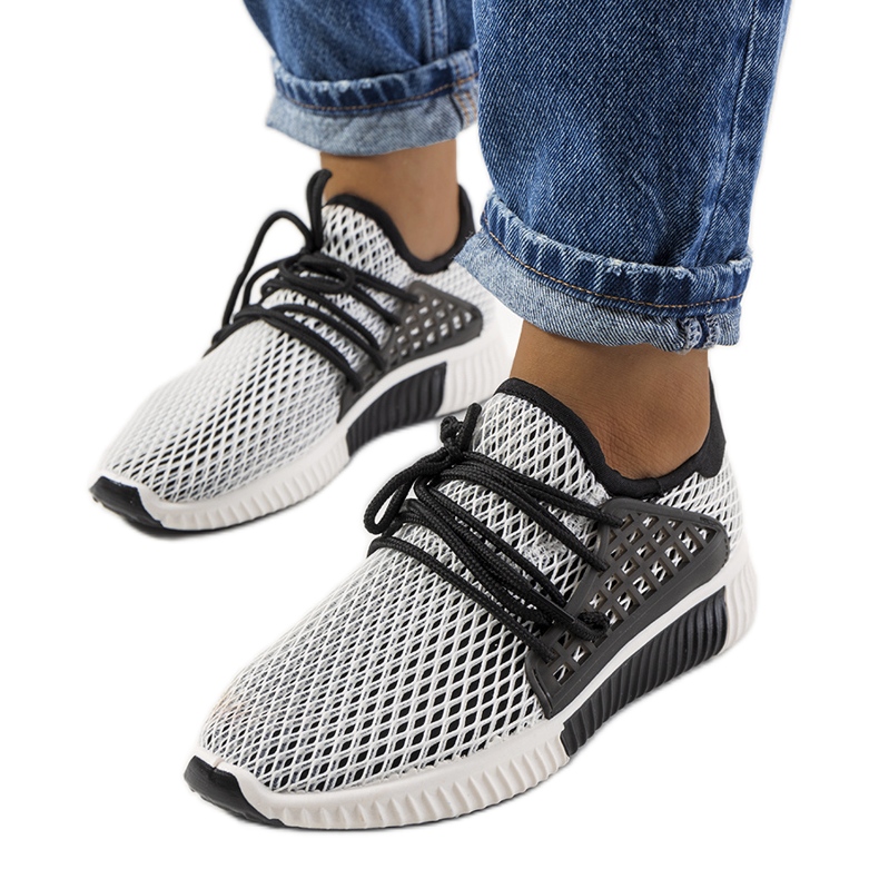 Black and white sports shoes from Coles