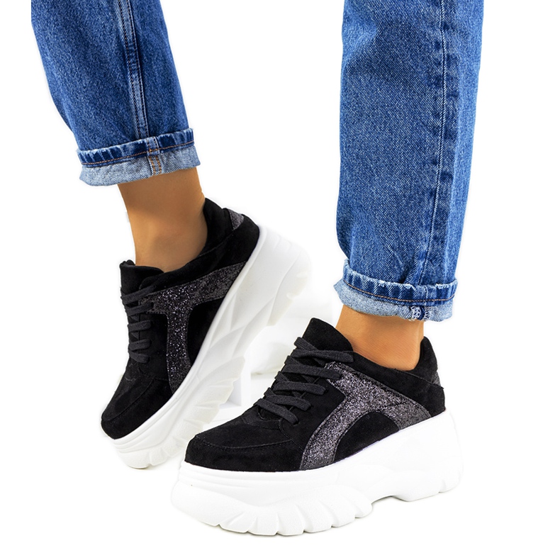 Black sports sneakers with a high Darnell sole
