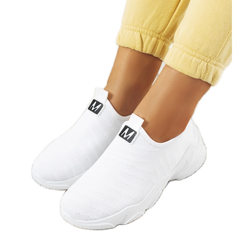 BM Aaron's white trainers