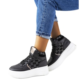 Black sneakers on the Dennis platform