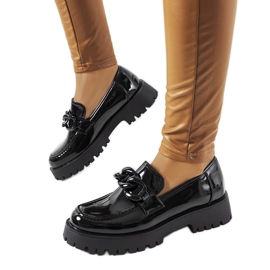 Black patent moccasins with a thick Dominick sole