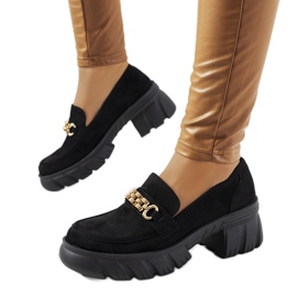 Black loafers on a thick Jeri sole