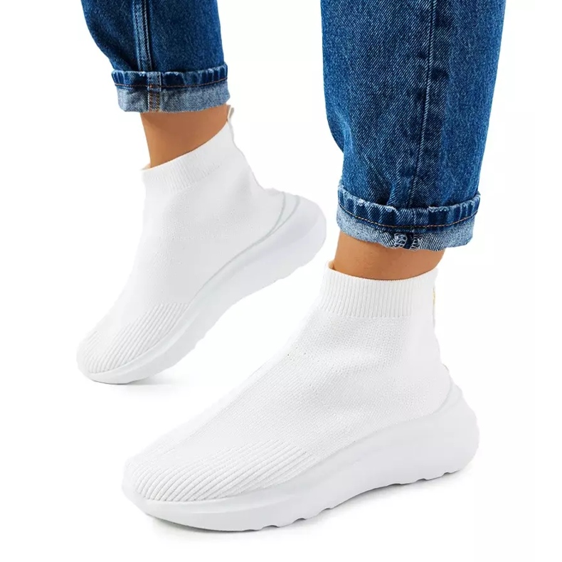 Jennifer's white high-top sneakers