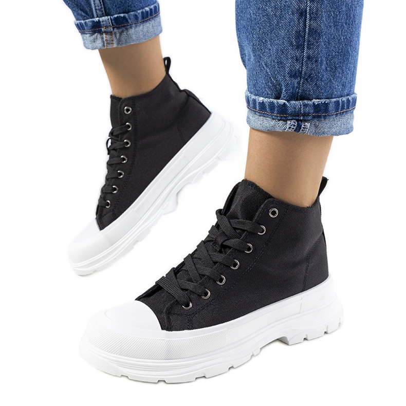Black ankle-high sneakers on the Boyes platform