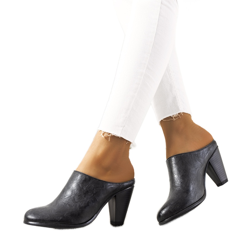 Black slippers on the Plotkin post