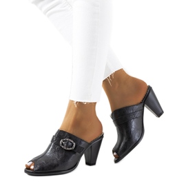 Black slippers on the Lucinda post