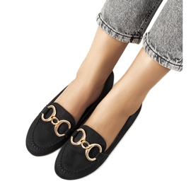 Black loafers with a Castor buckle Black loafers with a Castor buckle