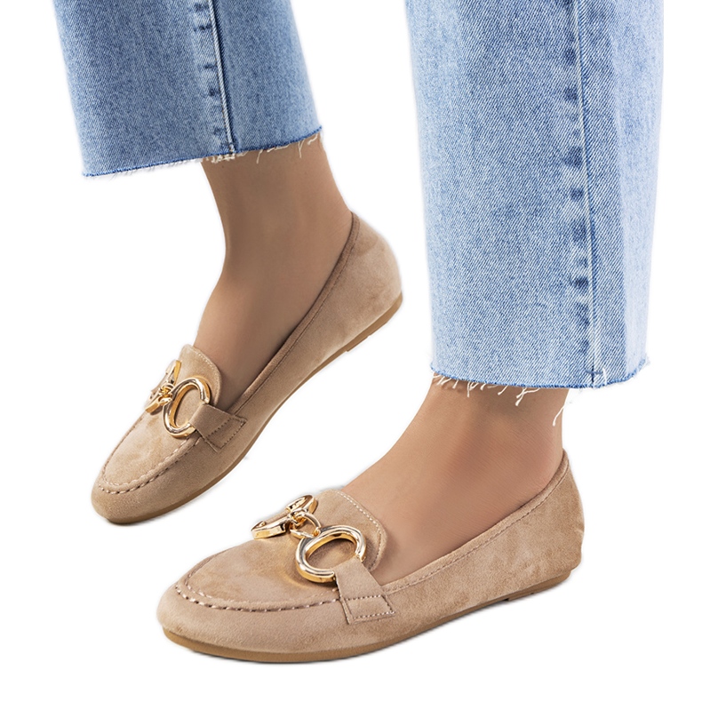 Beige loafers with a Castor buckle