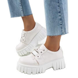 White shoes on a tractor sole from Sallie