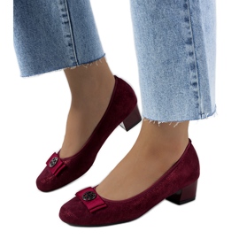 Shiny maroon pumps from Baten red