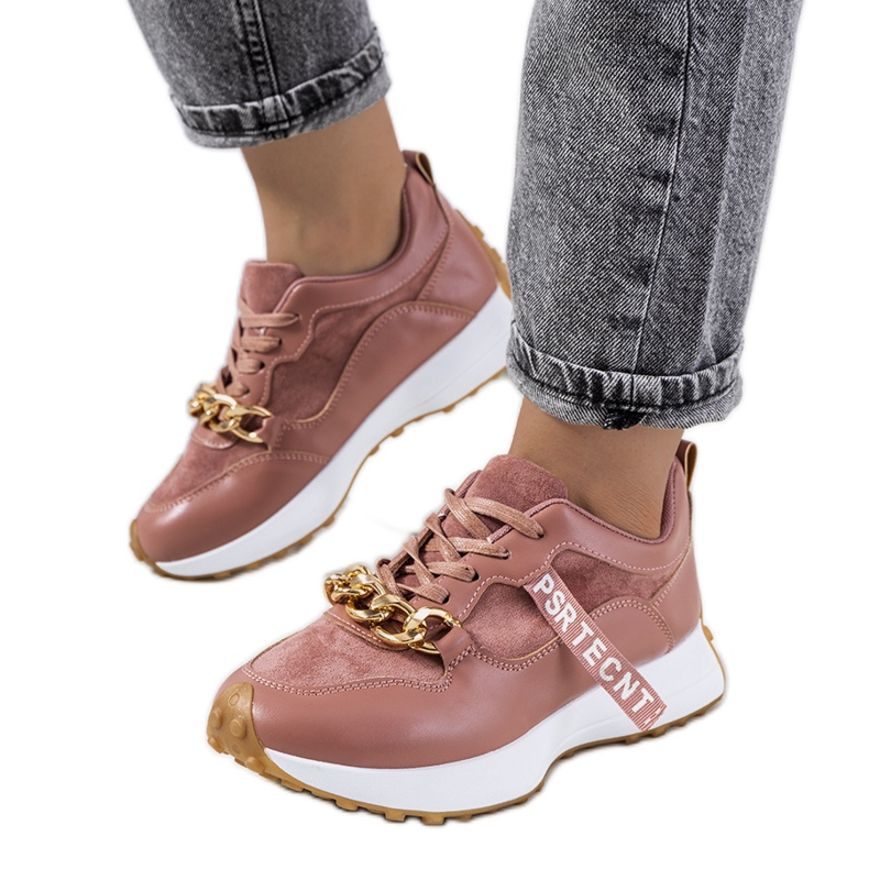 Samina's pink sneakers with a chain