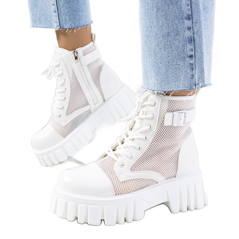 White boots with an openwork Potts upper