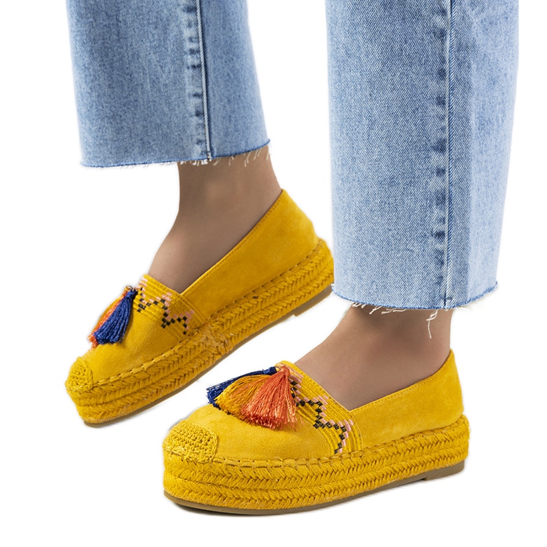 Yellow espadrilles on the Pisquid platform