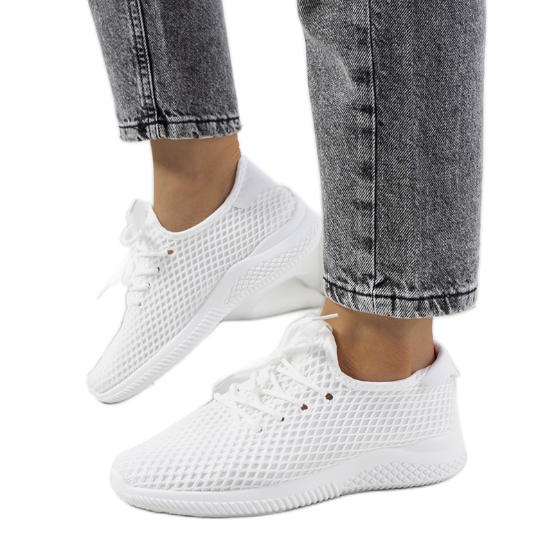 White sports sneakers from Amine