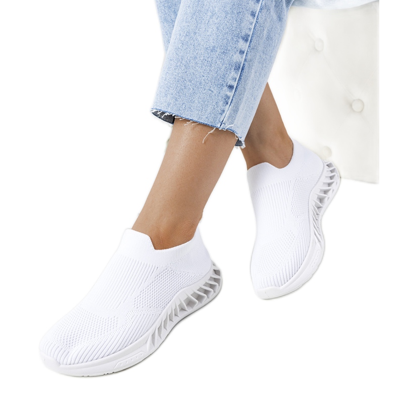 Neda's white sneakers
