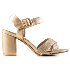 Encor Golden Sandals On A Bar