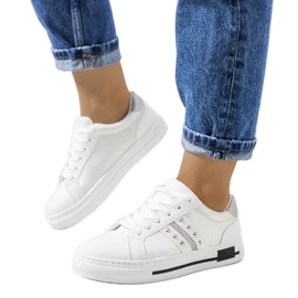 White sneakers with Luus studs