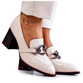 S.Barski Elegant pumps on a beige Callim pillar S.Barski Elegant pumps on a beige Callim pillar