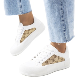 White and brown sneakers on the Birkett platform White and brown sneakers on the Birkett platform