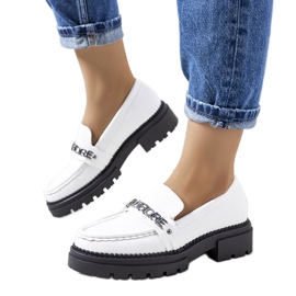 White loafers on a high Louelle sole