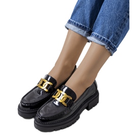 Black moccasins on a high Dorland sole
