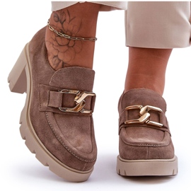 Elegant shoes on a pillar with a golden decoration, beige Harmell